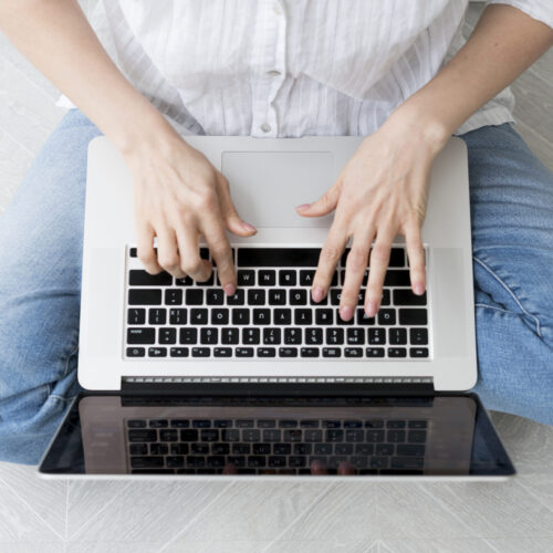 close-up-woman-typing-keyboard